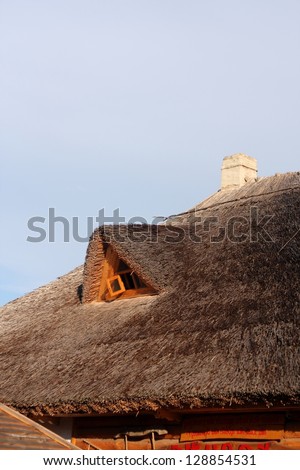 Roof of the house in the Ukrainian village of the blue sky/National traditions of Ukraine