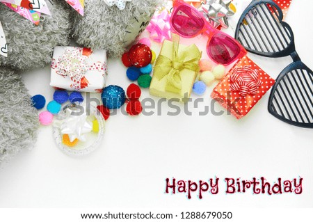 Happy birthday greeting card with gift box, glasses on white background