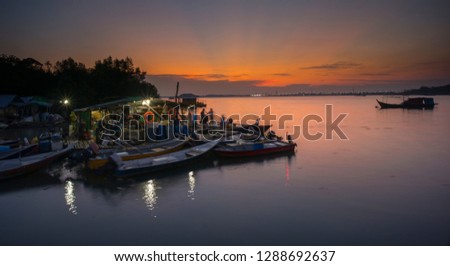 Sunset at fishermen village. Long exposure photography.