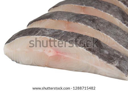 Sliced Halibut fish close up, isolated on white.