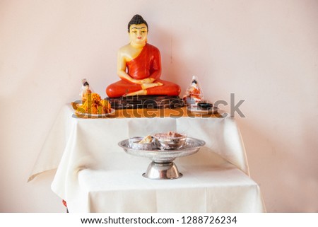 old buddha statue in a buddhism temple