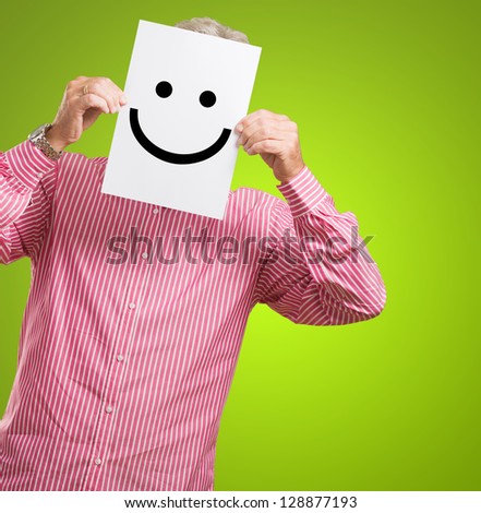 Man Hiding His Face Behind Paper On White Background