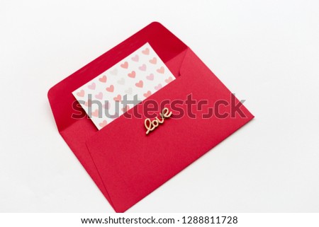 red envelope, gold letters "love"