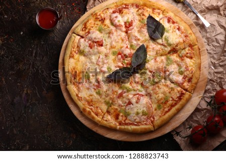 Pizza with Bay leaf and tomato 