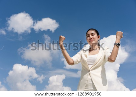 Successful businesswoman with blue sky cloud. Cloud computing, Online technology, Expressing Background for advertising.
