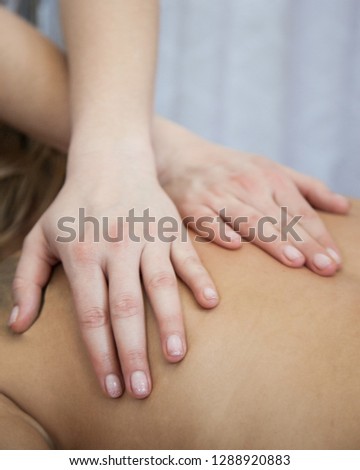 Massage of back, hands, beauty master