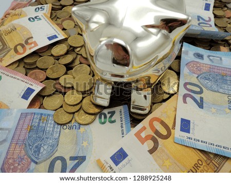 Piggy bank with bank notes and coins. Money concept. 