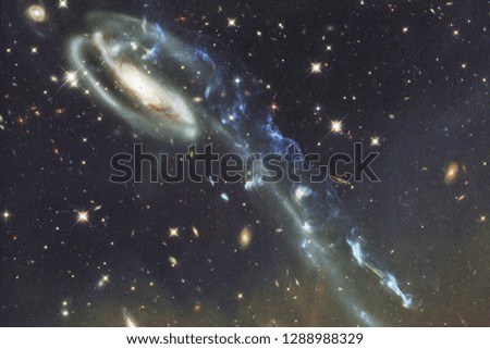 Galaxies, stars and nebulas in awesome space image. Colorful science fiction wallpaper. Elements of this image furnished by NASA.