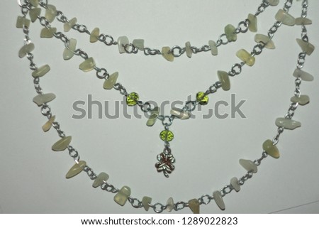 Handmade necklace made of wire and natural stone (nephritis, jade or axestone) 