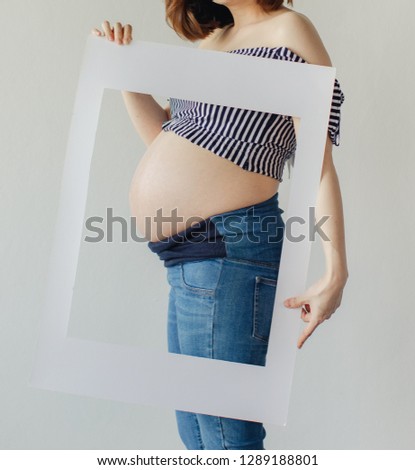 Pregnant Woman with White Frame