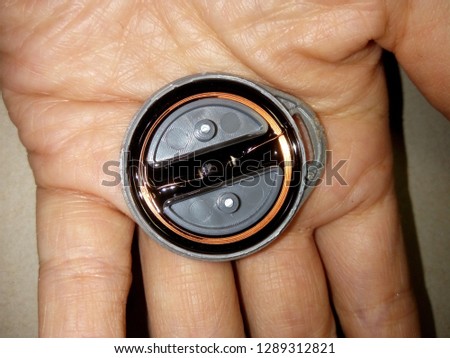 RFID keychain on hand. Its internal structure. Royalty-Free Stock Photo #1289312821