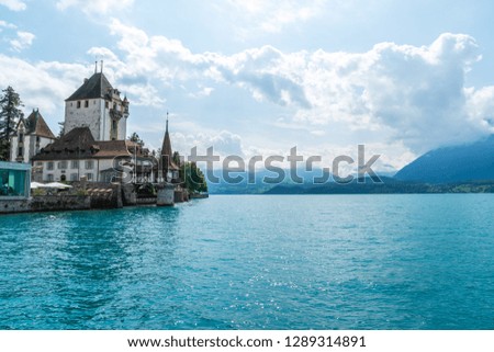 Beautiful Architecture at Oberhofen Castle with Thun Lake background in Switzerland
