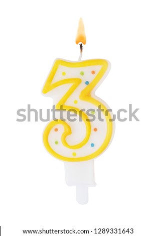 Burning birthday candle isolated on white background, number 3
