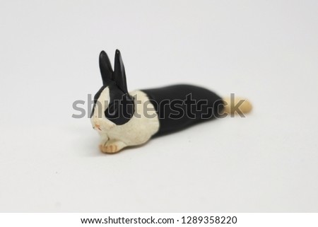 bunny toy on gray background
