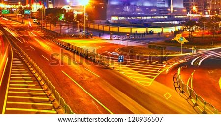 Vibrant city intersection at night