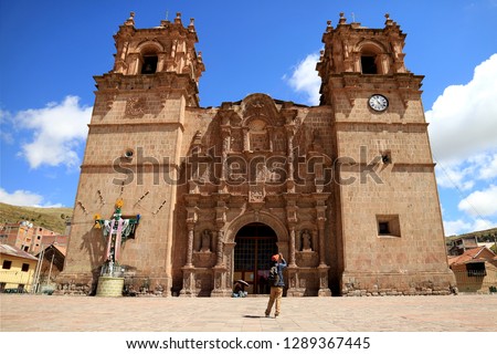 Traveler Photographing the Cathedral Basilica of St. Charles Borromeo or Cathedral of Puno, Peru