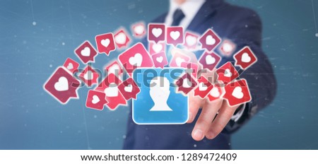 View of a Businessman holding  Like notification on a contact on a social media 3d rendering