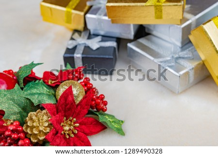 Poinsettia and present box (Christmas image)