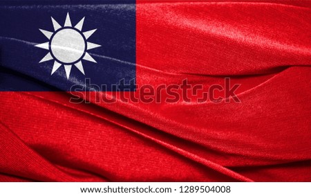 Realistic flag of Taiwan on the wavy surface of fabric. Perfect for background or texture purposes
