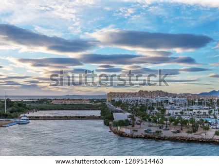Sunrise over the channel between the Mar Menor and the 
Mediterranean Sea. La Manga, Spain.
