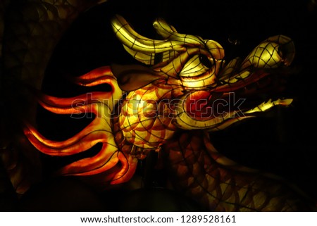 Lit up illuminated dragon lantern, Hoi An, Vietnam.