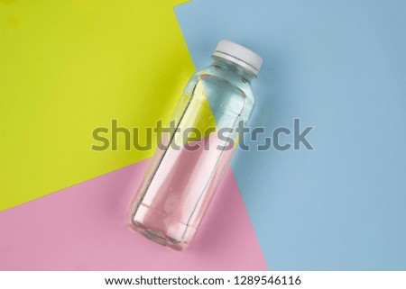 top view flat lay water bottle on a vibrant background 