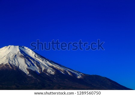 Mount Fuji located on Honshū, is the highest mountain in Japan at 3,776.24 m (12,389 ft), 2nd-highest peak of an island (volcanic) in Asia, and 7th-highest peak of an island in the world.