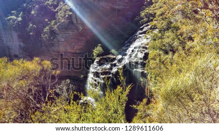 Waterfall and sunshine