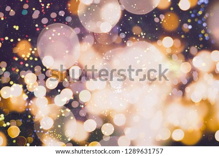 Festive background with natural bokeh and bright golden lights. Vintage Magic background with colorful bokeh. Spring Summer Christmas New Year disco party background.