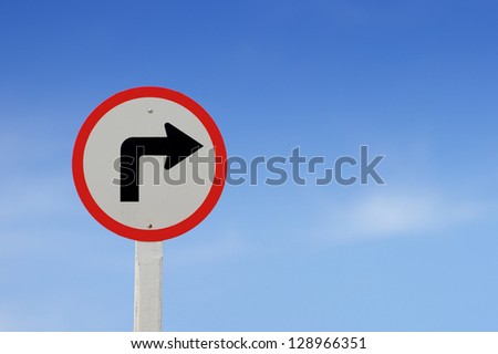 Traffic sign show the turn right on blue sky blank for text Royalty-Free Stock Photo #128966351