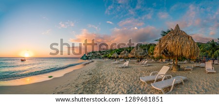 Sunset at Cas Abou Beach on the caribbean island of Curacao Royalty-Free Stock Photo #1289681851