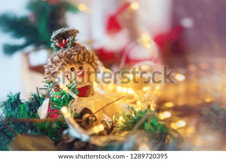 Christmas toy snowman with a shallow depth of field