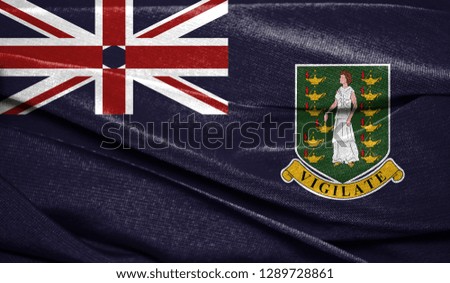 Realistic flag of British Virgin Islands on the wavy surface of fabric. Perfect for background or texture purposes