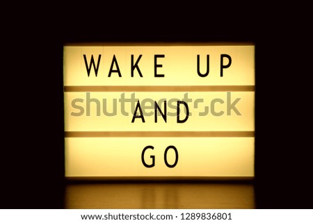 Lightbox with words Wake Up And Go
