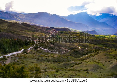 view of the beautiful clouds in the mountains. The texture of the clouds down the mountain gorges into the valleys to the little villages in the valleys of the rivers in Nepal are the Annapurna mountain