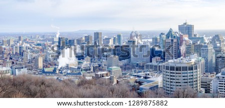 Scenic beautiful aerial panoramic view of Montreal. Depressive winter look of the largest megapolis city of Quebec in Canada 