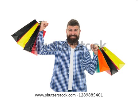 Bearded man with shopping bags.. Mature happy hipster with beard. Shopping sale. Male barber care. brutal caucasian hipster with moustache. Black Friday. Cyber Monday. Heavy bags.