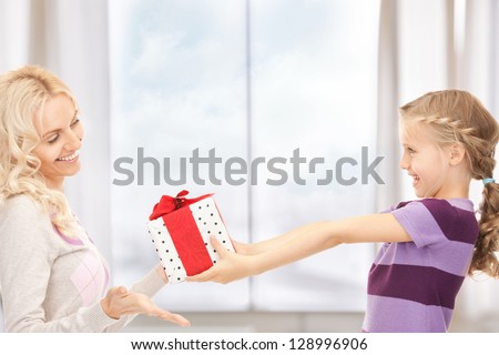 picture of mother and little girl with gifts