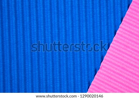 Blue and pink corrugated paper texture, use for background. vivid colour with copy space for add text or object.