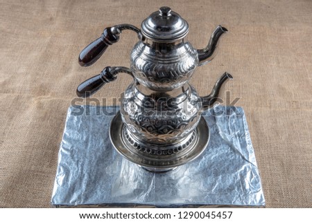 Traditional Turkish tea brewing set (semaver) or tea urn in outdoor scene