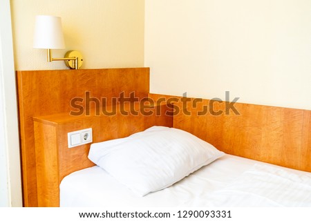 white pillows on bed decoration in bedroom interior