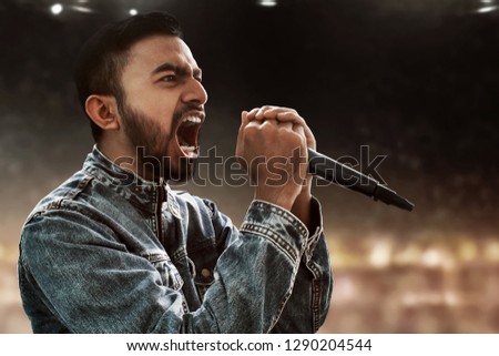 Singer singing with microphone