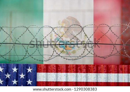 American flag and barbed wire, USA Mexico border wall