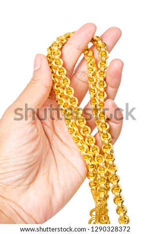 gold necklace on hand isolated on white background, Save clipping path.