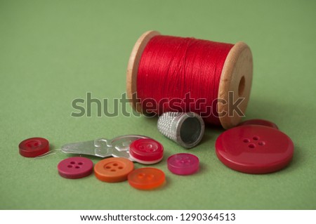 closeup of sewing set on green background