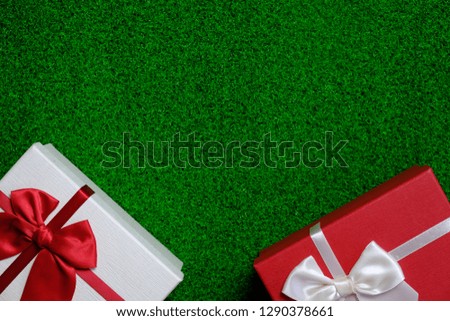 Happy New Year present. Gift box and red ribbon for Christmas