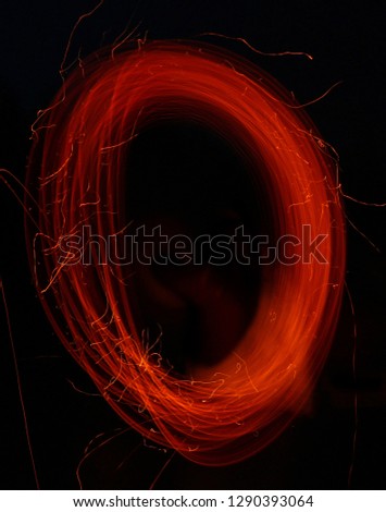 Fire letter O in long shutter speed at night