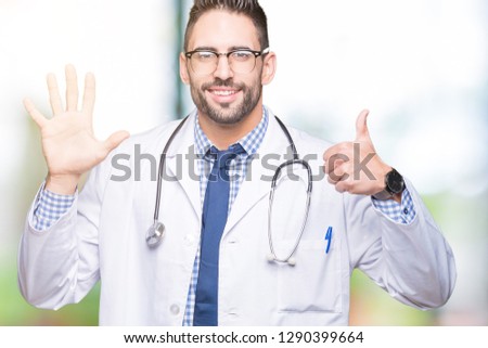 Handsome young doctor man over isolated background showing and pointing up with fingers number six while smiling confident and happy.