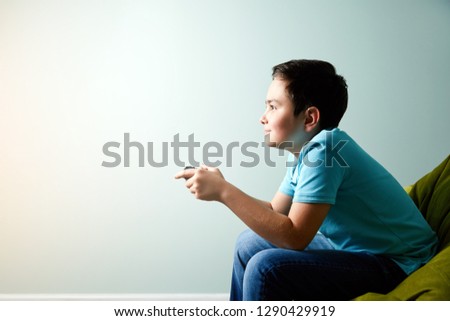 cute kid playing video games