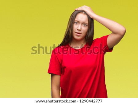 Young beautiful caucasian woman over isolated background confuse and wonder about question. Uncertain with doubt, thinking with hand on head. Pensive concept.